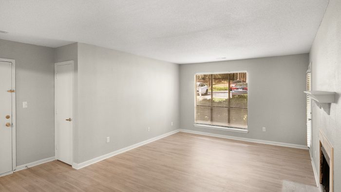 empty room with hardwood floors and a window at The  Sawyer