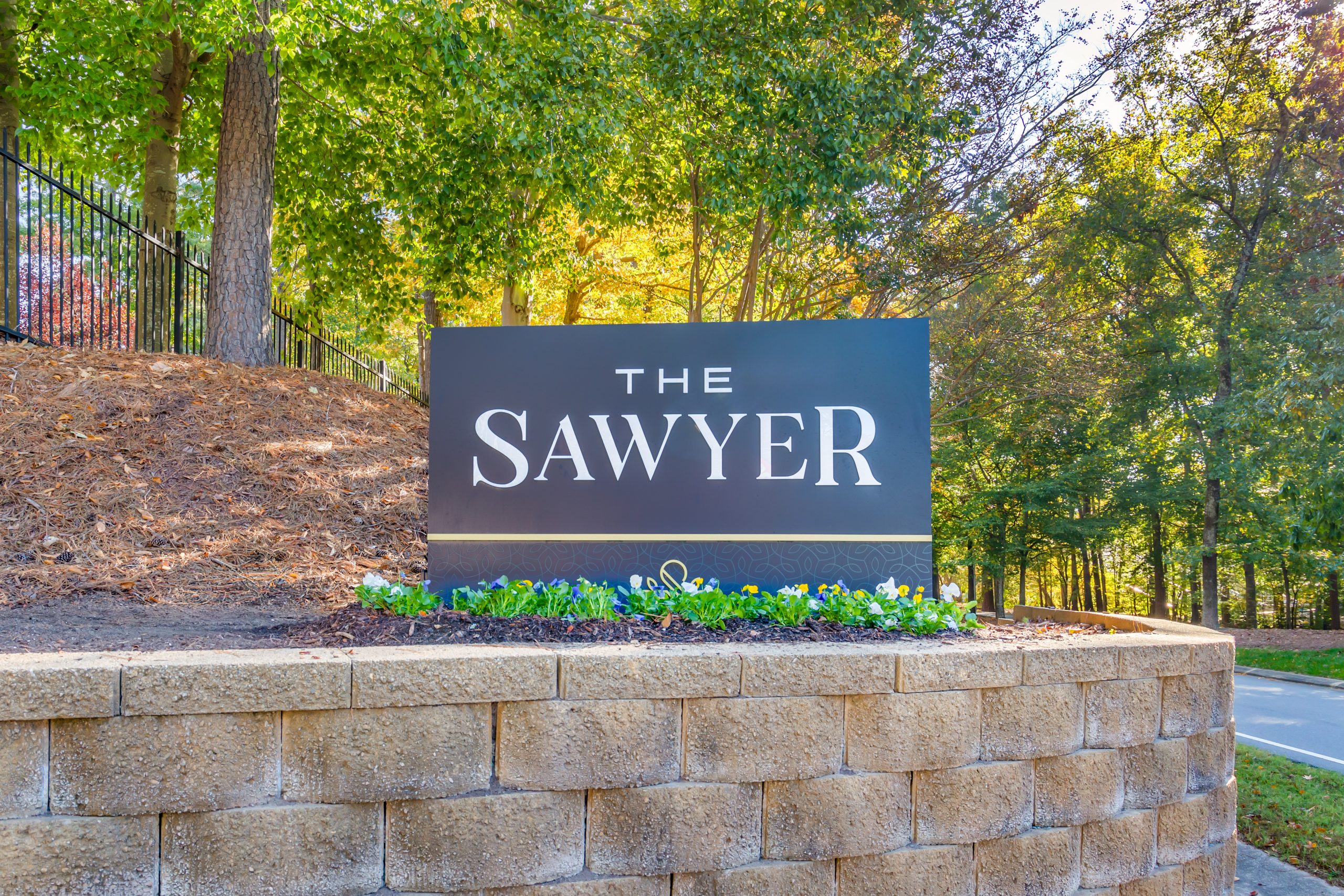 the sawyer sign in front of a brick wall at The  Sawyer
